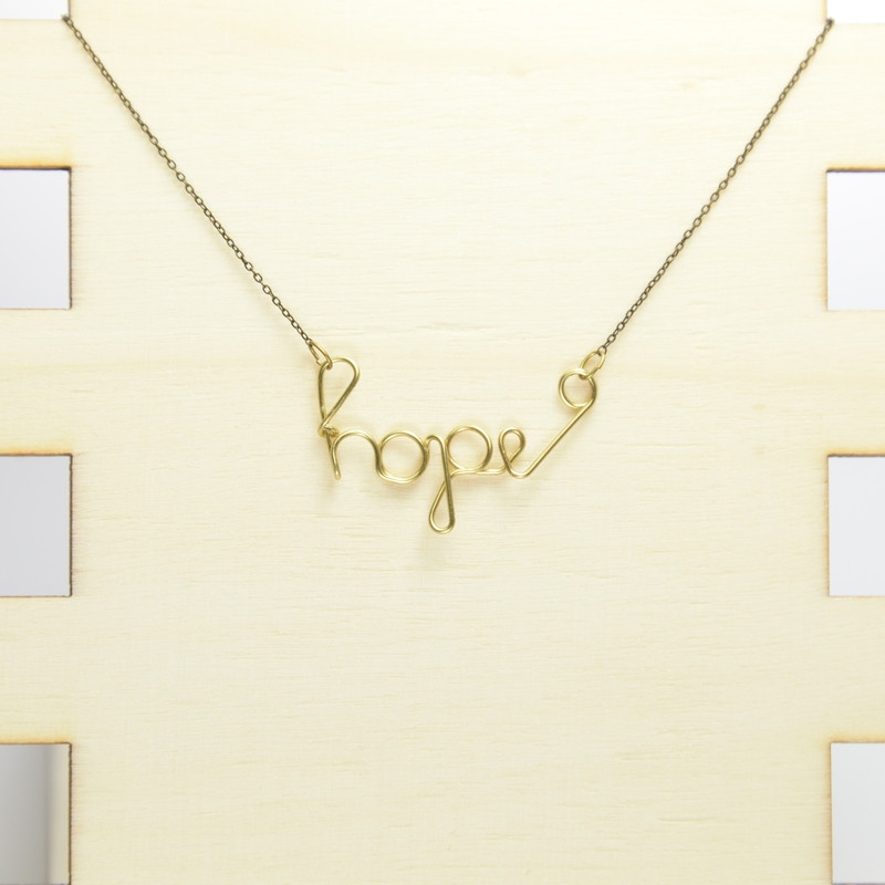 Collier HOPE laiton